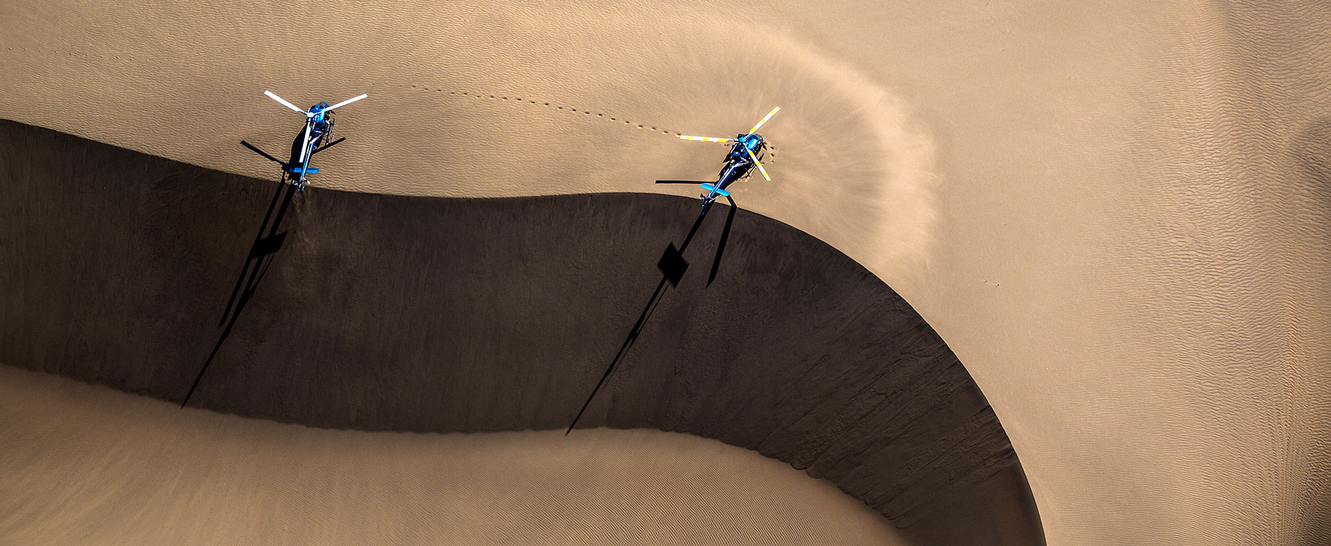 Tropic Air helicopters on the sand dunes in the Suguta @ Sean Dundas