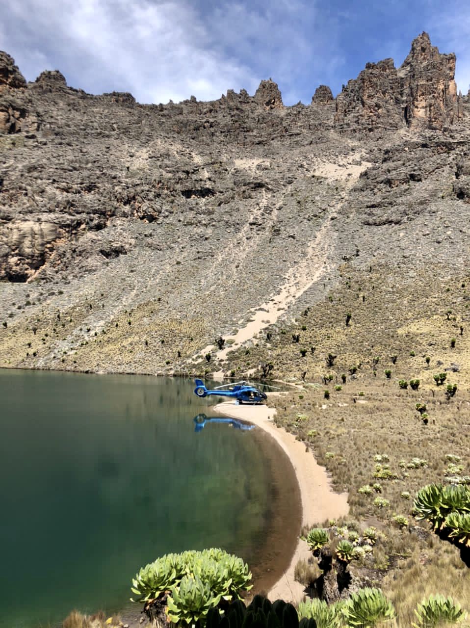 Helicopter at Enchanted Lake on Mount Kenya